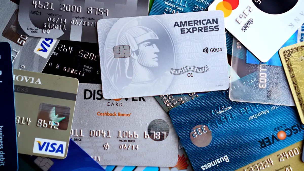 Capital One settlement payment delay explained as a customer checks a bank app for a settlement deposit